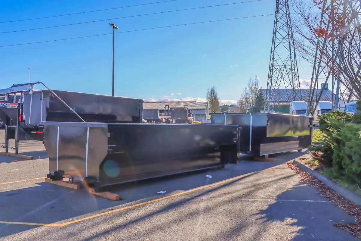 Roll-off dumpster ready for waste disposal at job site for Yard Waste Dumpster Rental in Milton